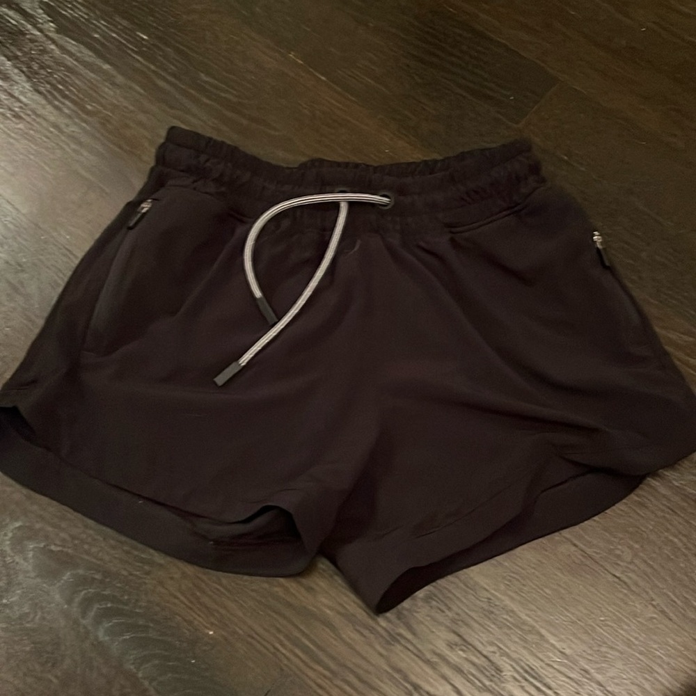 Athleta Girl L/12 athletic black shorts with pockets and adjustable waist